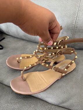 Valentino Garavani Tan Leather T-Strap Sandals with Gold Pyramid Studs